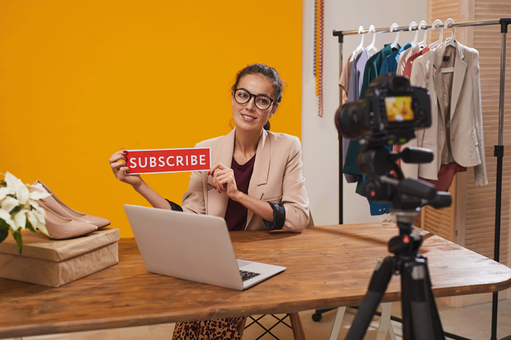 A woman asking to subscribe her YouTube Channel